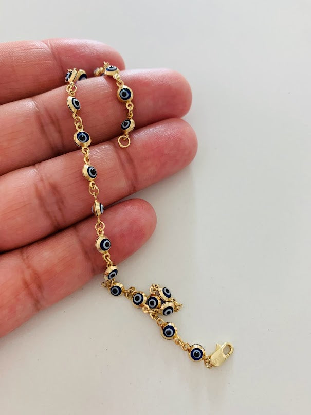 Amazon.com: 14k Gold Enamel Mini Evil Eye Bracelet | Small Blue Evil Eye  Chain | Perfect Gift for Women, Girls, and Mother's Day : Handmade Products